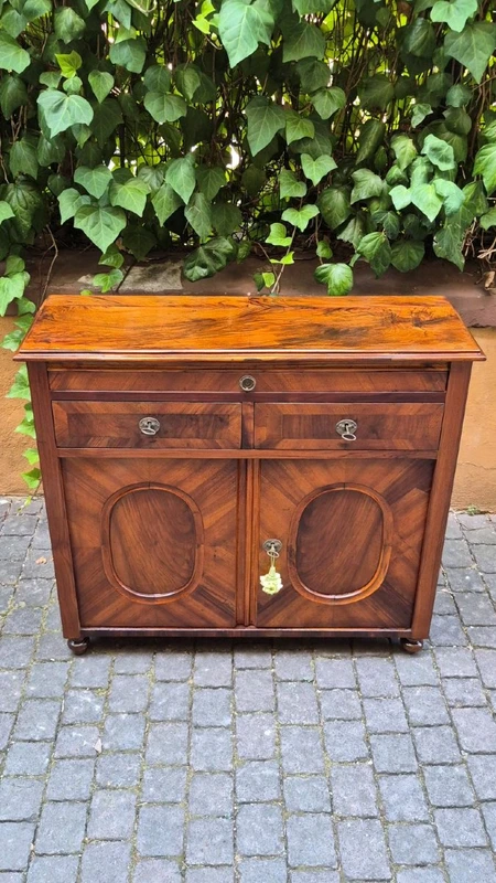 Narrow antique sideboard with walnut veneer