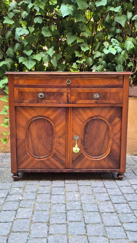 Narrow antique sideboard with walnut veneer