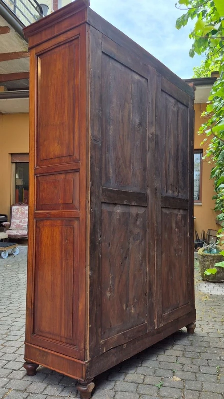 Antique cherry wood paneled pantry cabinet