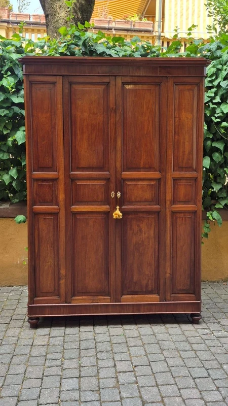 Antique cherry wood paneled pantry cabinet