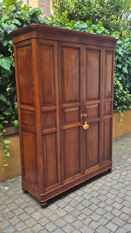 Antique cherry wood paneled pantry cabinet