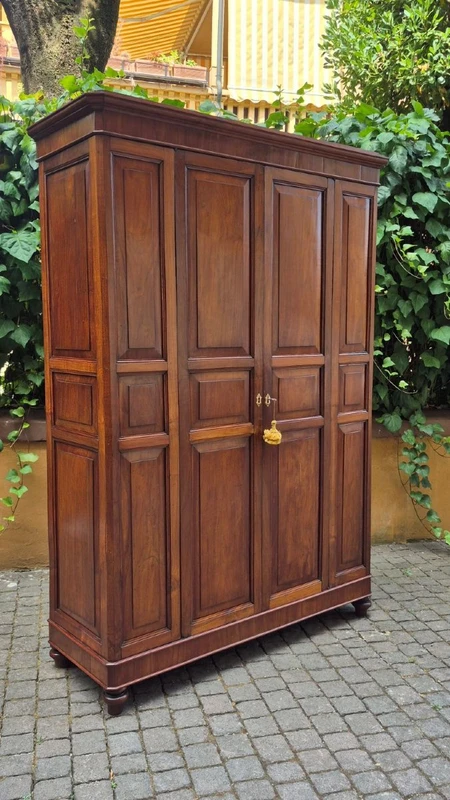 Antique cherry wood paneled pantry cabinet
