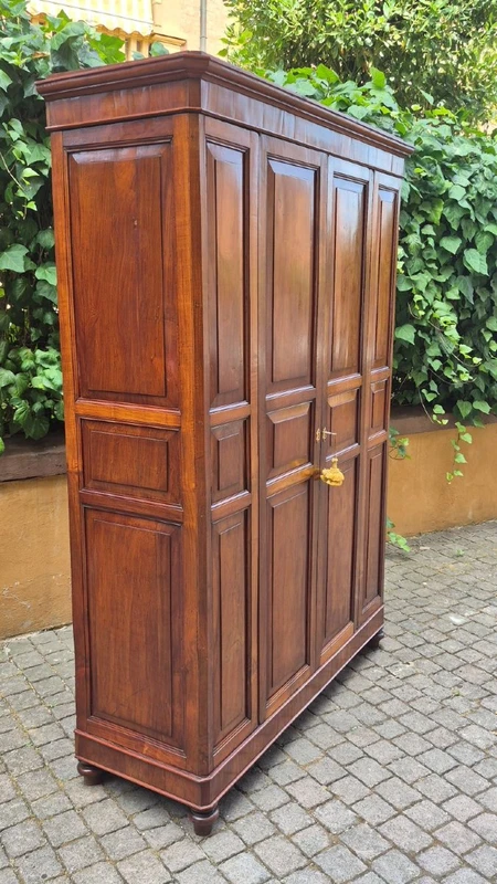 Antique cherry wood paneled pantry cabinet