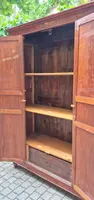 Antique cherry wood paneled pantry cabinet