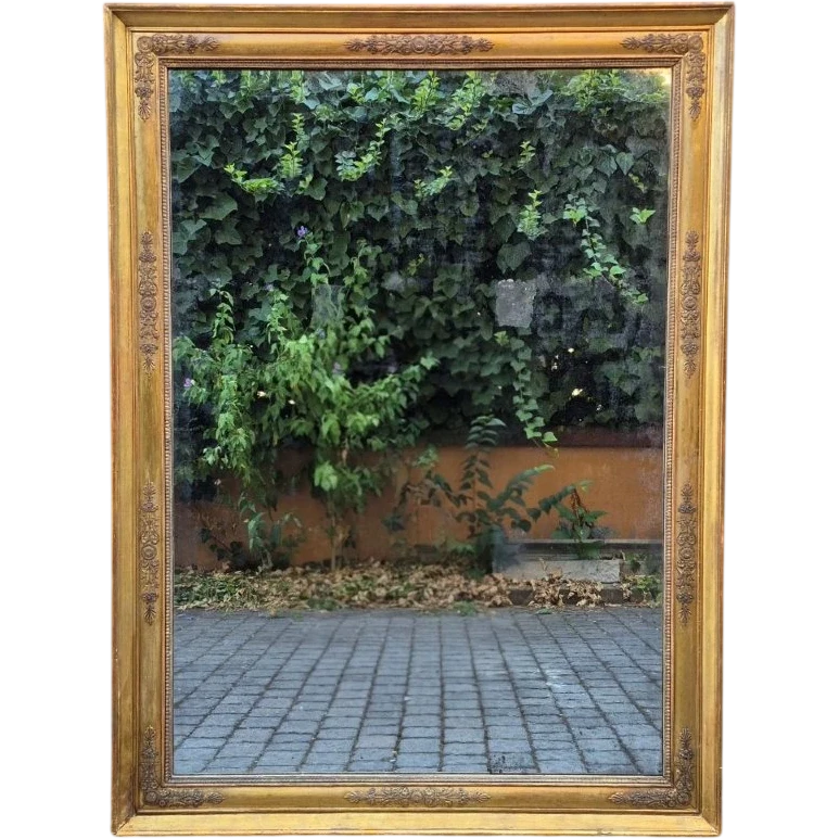 Antique gilded Empire-style mirror with a mercury mirror