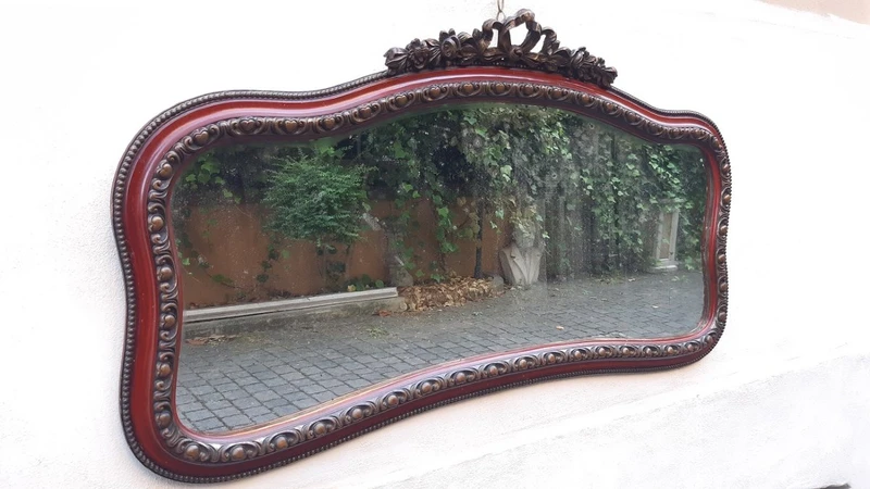 Antique horizontal mirror from the 19th century with a cornice