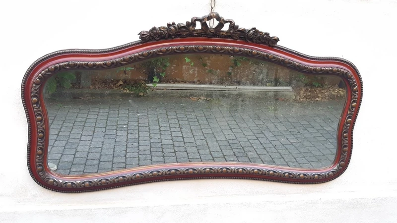 Antique horizontal mirror from the 19th century with a cornice