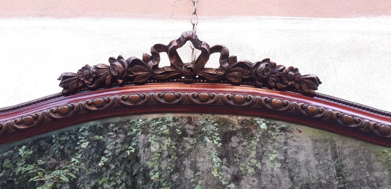 Antique horizontal mirror from the 19th century with a cornice