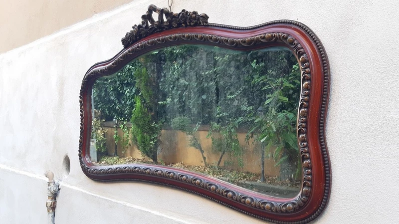 Antique horizontal mirror from the 19th century with a cornice