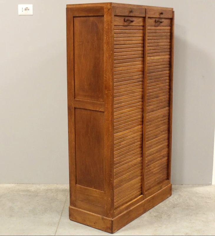 Antique oak filing cabinet with sliding doors
