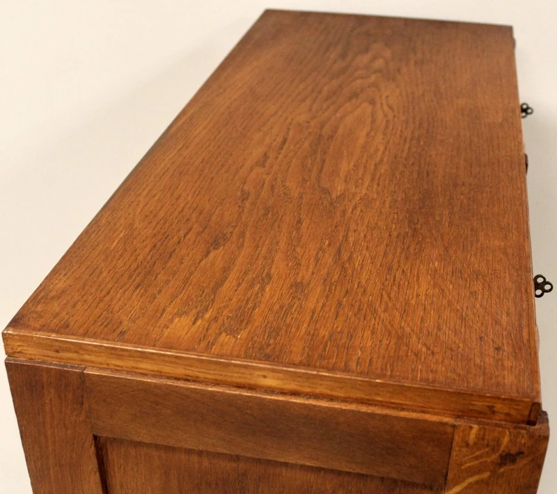 Antique oak filing cabinet with sliding doors