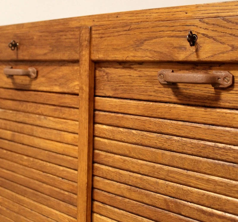 Antique oak filing cabinet with sliding doors