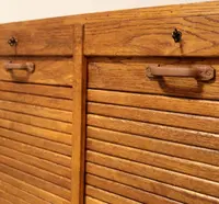 Antique oak filing cabinet with sliding doors