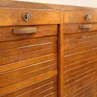 Antique oak filing cabinet with sliding doors