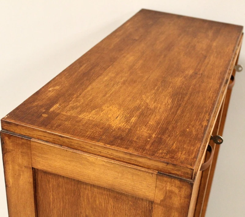 Antique oak filing cabinet with sliding doors
