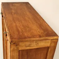 Antique oak filing cabinet with sliding doors