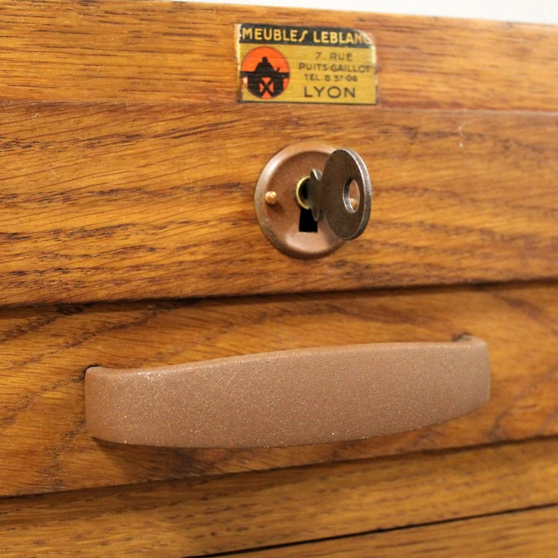 Antique oak filing cabinet with sliding doors