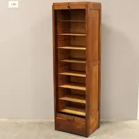 Antique oak filing cabinet with sliding doors