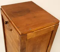 Antique oak filing cabinet with sliding doors