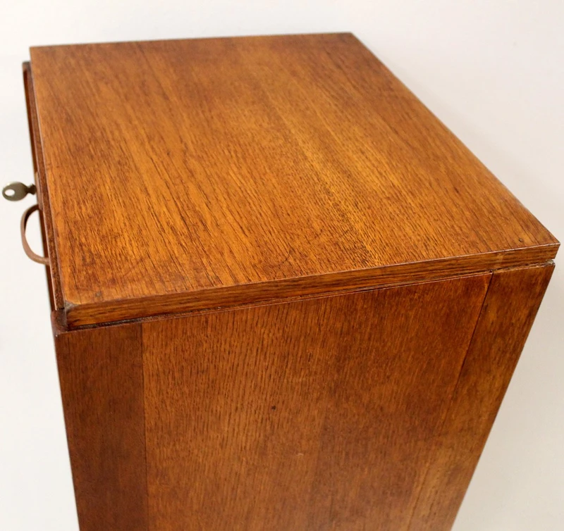 Antique oak filing cabinet with sliding doors