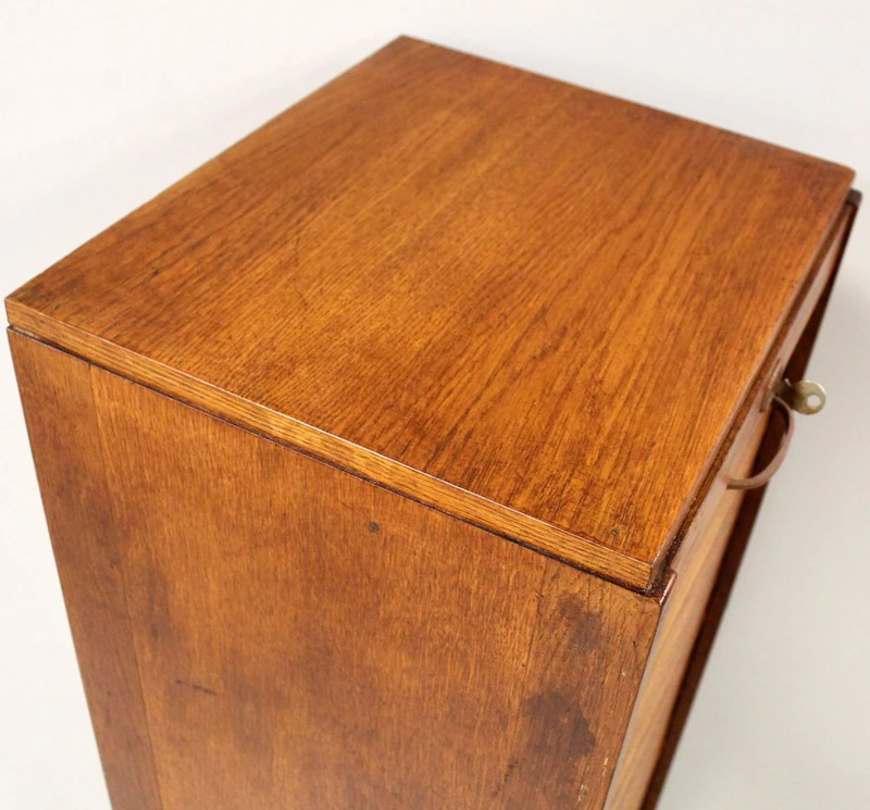 Antique oak filing cabinet with sliding doors