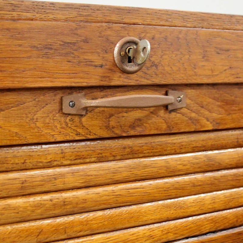 Antique oak filing cabinet with sliding doors