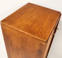 Antique oak filing cabinet with sliding doors
