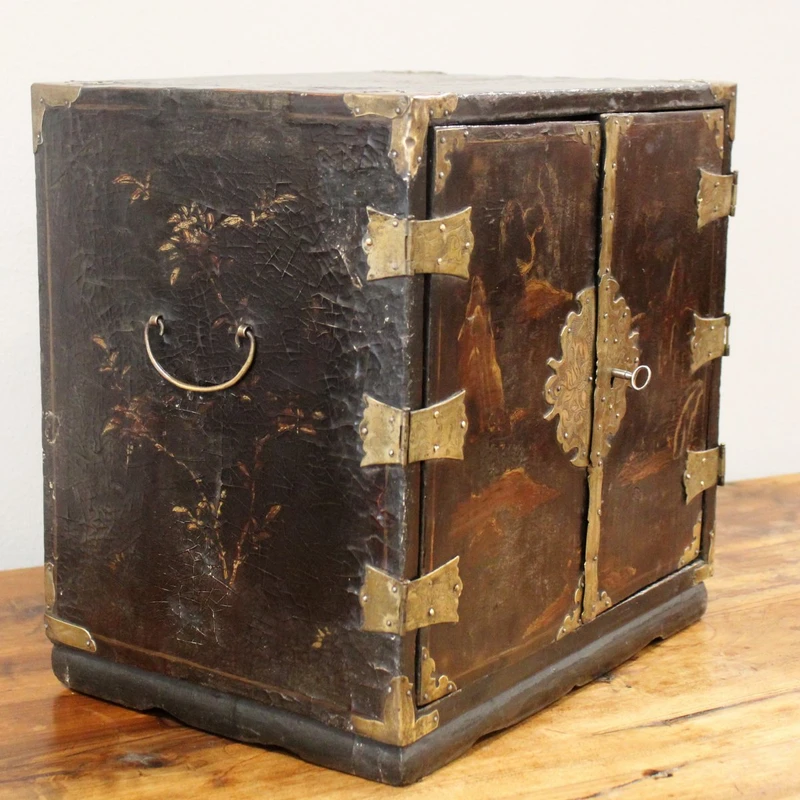 Antique coin cabinet and travel jewelry box made of lacquered and painted wood