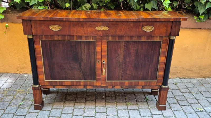Narrow antique Empire-style sideboard in walnut