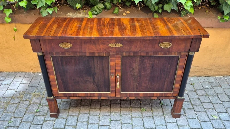 Narrow antique Empire-style sideboard in walnut