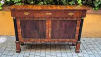 Narrow antique Empire-style sideboard in walnut