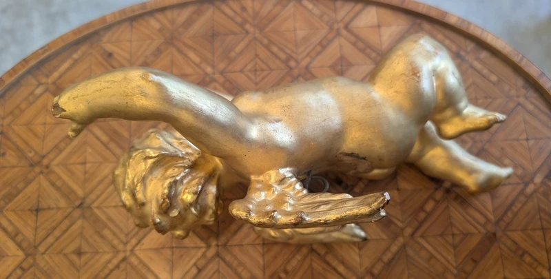 Carved and gilded wooden winged putto – early 20th century