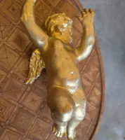 Carved and gilded wooden winged putto – early 20th century