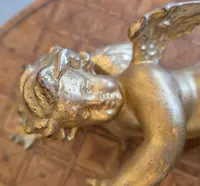 Carved and gilded wooden winged putto – early 20th century
