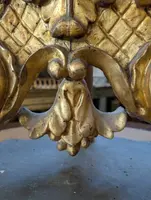 Carved and gilded wooden riser