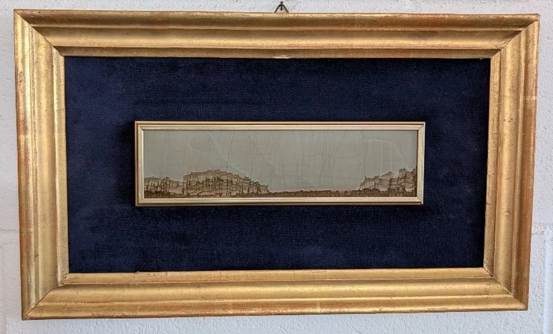 A small Tuscan village in a 19th-century gilded frame