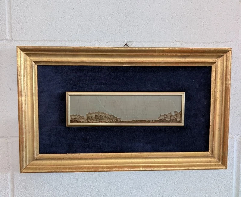 A small Tuscan village in a 19th-century gilded frame