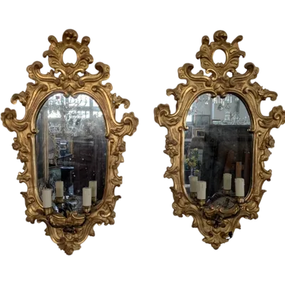 Pair of Sienese mirrors in gilded wood – First half of the 19th century