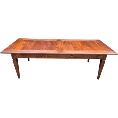 Large antique dining table made of walnut and cherry wood