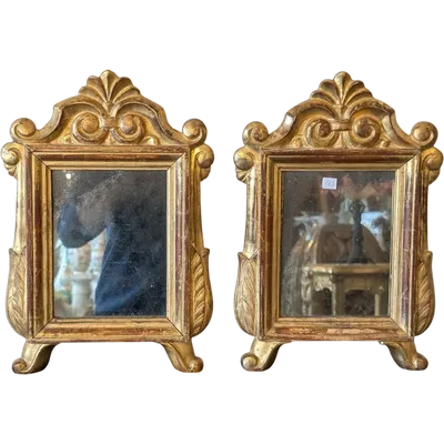Pair of small carved wooden mirrors gilded with pure gold – Early 19th century