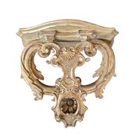 Wall shelf with carved and gilded elements from the 18th century
