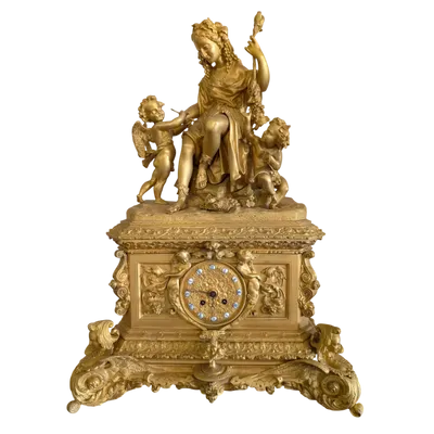 Gilt bronze mantel clock with female figure and putti
