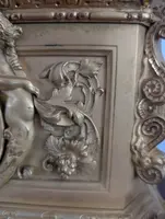 Gilt bronze mantel clock with female figure and putti