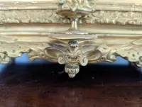 Gilt bronze mantel clock with female figure and putti