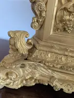 Gilt bronze mantel clock with female figure and putti