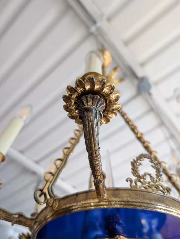 Six-light gilt bronze and blue enameled glass chandelier