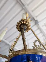 Six-light gilt bronze and blue enameled glass chandelier
