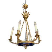Six-light gilt bronze and blue enameled glass chandelier