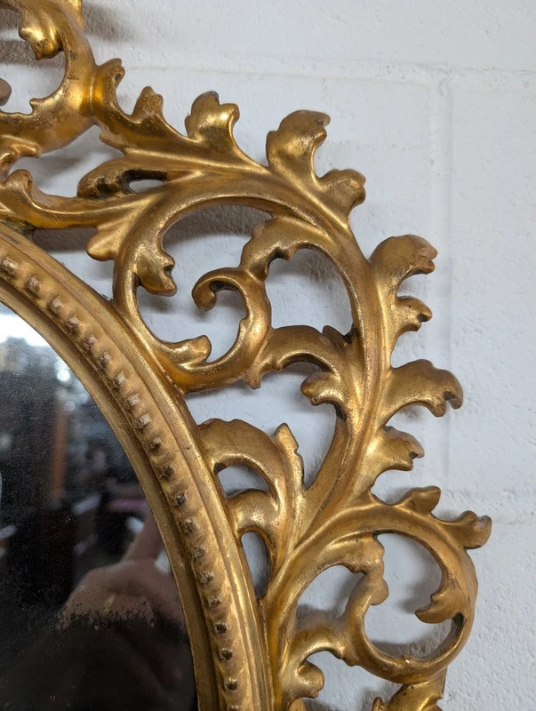 Florentine oval mirror in carved wood gilded with pure gold - mid-19th century