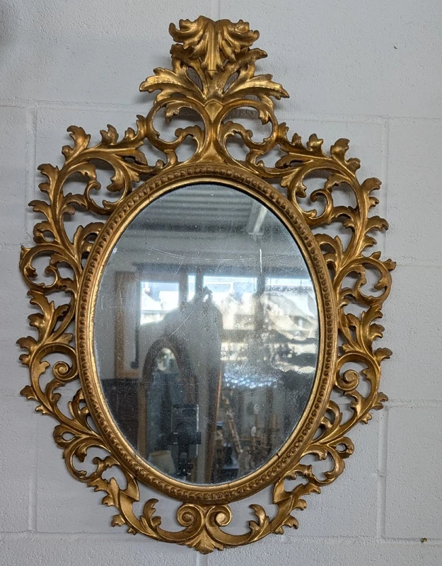 Florentine oval mirror in carved wood gilded with pure gold - mid-19th century
